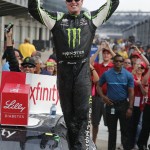 
              Kyle Busch celebrates winning the NASCAR Xfinity Series auto race at Indianapolis Motor Speedway in Indianapolis, Saturday, July 25, 2015. (AP Photo/AJ Mast)
            