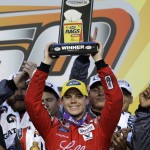 
              Ryan Reed holds up the trophy in Victory Lane after winning the ARCA auto race at Chicagoland Speedway, Saturday, June 20, 2015, in Joliet, Ill. (AP Photo/Nam Y. Huh)
            