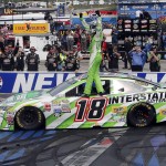 
              Kyle Busch celebrates at the finish line After winning the the NASCAR Sprint Cup series auto race at New Hampshire Motor Speedway Sunday, July 19, 2015, in Loudon, N.H. (AP Photo/Jim Cole)
            
