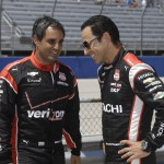
              Juan Pablo Montoya, left, and Helio Castroneves wait during qualifying at the IndyCar Series race at the Milwaukee Mile in West Allis, Wis., Sunday, July 12, 2015. (AP Photo/Jeffrey Phelps)
            