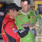 
              Driver Greg Biffle, left, and Kyle Busch talk in the garage during a NASCAR Sprint Cup practice session at Daytona International Speedway, Friday, July 3, 2015, in Daytona Beach, Fla. Both were involved in a crash during the first practice session. (AP Photo/Terry Renna)
            