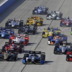 
              Josef Newgarden (67) leads at the start of the IndyCar Series race at the Milwaukee Mile in West Allis, Wis., Sunday, July 12, 2015. (AP Photo/Jeffrey Phelps)
            