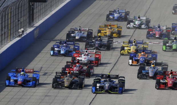 Josef Newgarden (67) leads at the start of the IndyCar Series race at the Milwaukee Mile in West Al...