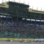 
              NASCAR drivers take the green flag at the start of a Truck Series auto race at Kansas Speedway in Kansas City, Kan., Friday, May 8, 2015. (AP Photo/Colin E. Braley)
            