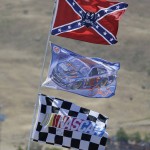 
              A number of flags, including a Confederate themed one,  fly atop RV's in a campground outside the track during practice for the NASCAR Sprint Cup Series auto race Friday, June 26, 2015, in Sonoma, Calif. (AP Photo/Eric Risberg)
            