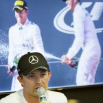 
              Mercedes driver Nico Rosberg of Germany talks to journalists during a news conference in a motorhome at the Monaco racetrack, in Monaco, Wednesday, May 20, 2015. On the picture in the background Rosberg is seen with his teammate Lewis Hamilton. The Formula One Grand Prix of Monaco will be held on Sunday. (AP Photo/Gero Breloer)
            