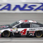 
              NASCAR driver Kevin Harvick (4) takes a lap during practice for Saturday's Sprint Cup Series auto race at Kansas Speedway in Kansas City, Kan., Friday, May 8, 2015. Harvick is the Sprint Cup Series points leader. (AP Photo/Colin E. Braley)
            