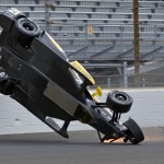 
              The car driven by Josef Newgarden begins to go airborne after hitting the wall in the first turn during practice for the Indianapolis 500 auto race at Indianapolis Motor Speedway in Indianapolis, Thursday, May 14, 2015.  (AP Photo/Marty Seppala)
            