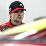 
              Driver Jeff Gordon watches as the crunched rear panel of his car is worked on practice for Sunday's NASCAR Sprint Cup series auto race at New Hampshire Motor Speedway, Loudon, N.H., Saturday, July 18, 2015  (AP Photo/Cheryl Senter)
            