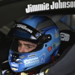 
              Jimmie Johnson waits in his car in the garage at Pocono Raceway during practice for Sunday's NASCAR Sprint Cup Series auto race in Long Pond, Pa., Friday, June 5, 2015. (AP Photo/Derik Hamilton)
            