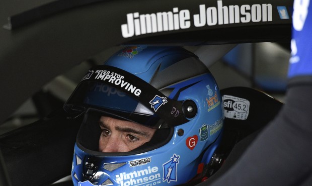 Jimmie Johnson waits in his car in the garage at Pocono Raceway during practice for Sunday’s ...
