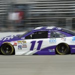 
              Denny Hamlin drives his car during qualifying for Sunday's NASCAR Sprint Cup series auto race, Friday, May 29, 2015, at Dover International Speedway in Dover, Del. Hamlin won the pole. (AP Photo/Nick Wass)
            
