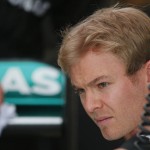 
              German Mercedes driver Nico Rosberg watches technicians during the first training session for the British Formula One Grand Prix at Silverstone circuit, Silverstone, England, Friday, July 3, 2015. The British Formula One Grand Prix will be held on Sunday July 5. (AP Photo/Frank Augstein)
            