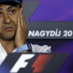 
              Williams driver Felipe Massa of Brazil speaks and gestures during a press conference before the Hungarian Formula One Grand Prix meeting at Hungaroring circuit near Budapest, Hungary, Thursday, July 23, 2015. The Hungarian Formula One Grand Prix will be held on Sunday July 26. (AP Photo/Darko Vojinovic)
            