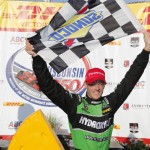 
              Sebastien Bourdais celebrates in the winners circle after the IndyCar Series race at the Milwaukee Mile in West Allis, Wis., Sunday, July 12, 2015. (AP Photo/Jeffrey Phelps)
            