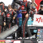 
              Austin Dillon celebrates in Victory Lane after winning the NASCAR Xfinity series auto race at Charlotte Motor Speedway in Concord, N.C., Saturday, May 23, 2015. (AP Photo/Terry Renna)
            