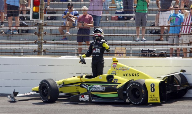Sage Karam reacts after being involved in a crash during the 99th running of the Indianapolis 500 a...