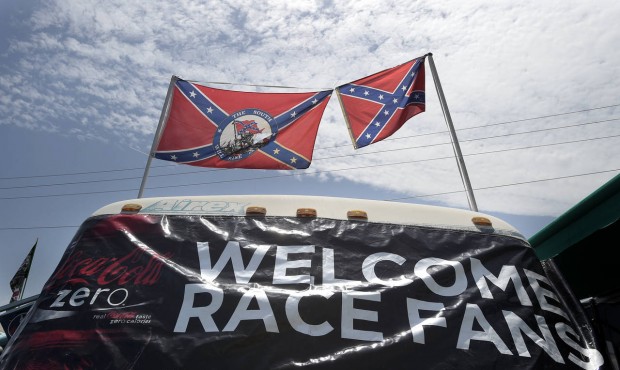 Confederate flags fly on top of a motor home at Daytona International Speedway, Saturday, July 4, 2...