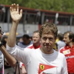 
              Ferrari driver Sebastian Vettel of Germany waves to spectators at the end of the third free practice at the Monaco racetrack, in Monaco, Saturday, May 23, 2015. The Formula one race will be held on Sunday. (AP Photo/Luca Bruno)
            