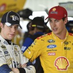 
              Brad Keselowski, left, stands with Joey Logano in the garage area at Pocono Raceway during practice for Sunday's NASCAR Sprint Cup Series auto race in Long Pond, Pa., Friday, June 5, 2015. (AP Photo/Derik Hamilton)
            