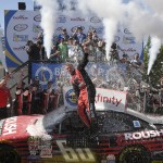 
              Chris Buescher celebrates in Victory Lane after he won the NASCAR Xfinity series auto race, Saturday, May 30, 2015, at Dover International Speedway in Dover, Del. (AP Photo/Nick Wass)
            