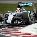 
              Mercedes driver Lewis Hamilton, of Great Britain, goes through the last chicane during the Canadian Grand Prix auto race on Sunday, June 7, 2015, in Montreal. (Tom Boland/The Canadian Press via AP) MANDATORY CREDIT
            
