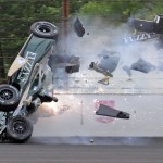 
              Ed Carpenter hits the wall in the second turn during practice before qualifications for the Indianapolis 500 auto race at Indianapolis Motor Speedway in Indianapolis, Sunday, May 17, 2015.  Carpenter walked away from the crash and has been released from he track hospital after being checked. (AP Photo/Jamie Gallagher)
            