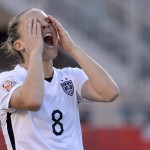 
              United States' Amy Rodriguez reacts after missing on a shot against China during the first half of a quarterfinal match in the FIFA Women's World Cup soccer tournament, Friday, June 26, 2015, in Ottawa, Ontario, Canada. (Adrian Wyld/The Canadian Press via AP)
            