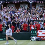
              Britain's Andy Murray celebrates winning a point from France's Gilles Simon during the quarterfinal tennis matches of the Davis Cup at the Queen's Club in London, Sunday July 19, 2015. (AP Photo/Tim Ireland)
            