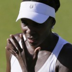 
              Venus Williams of the United States gestures during the women's singles first round match against Madison Brengle of the United States at the All England Lawn Tennis Championships in Wimbledon, London, Monday June 29, 2015. (AP Photo/Tim Ireland)
            