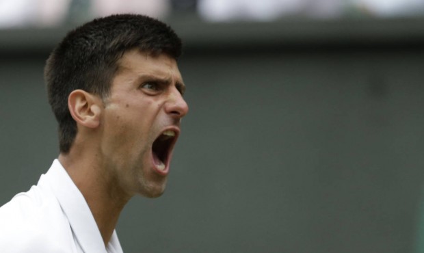 Novak Djokovic of Serbia celebrates winning a point during the men’s singles final against Ro...