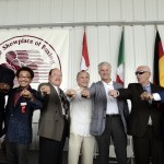 
              International Boxing Hall of Fame inductees from left, Riddick Bowe, Yoko Gushiken, Steve Smoger, Ray Mancini, Jim Lampley, Nigel Collins and Rafael Mendoza pose with their induction rings during the International Boxing Hall of Fame induction ceremony in Canastota, N.Y., Sunday, June 14, 2015. (AP photos/Heather Ainsworth)
            