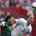 
              FILE - In this June 16, 2015, file photo, Nigeria's Onome Ebi, left, and United States' Abby Wambach vie for the ball during a FIFA Women's World Cup soccer game in Vancouver, British Columbia, Canada. With the title match looming, Wambach isn't mincing words. "All I care about is winning this World Cup," she said. The star U.S. forward is playing in her fourth Women's World Cup, and she says it will be her last. A victory Sunday, July 5, in the final against Japan would be the perfect ending to her World Cup career. (Darryl Dyck/The Canadian Press via AP, File)
            