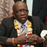 
              FILE - In this June 2, 2011,  file photo, suspended FIFA executive Jack Warner gestures during a news conference at the airport in Port-of-Spain, Trinidad and Tobago. Interpol added six men with ties to FIFA to its most wanted list on Wednesday, June 3, 2015, issuing an international alert for two former FIFA officials and four executives on charges including racketeering and corruption. Two of the men, former FIFA vice president Jack Warner of Trinidad and former executive committee member Nicolas Leoz of Paraguay, have been arrested in their home counties. Warner has since been released and Leoz is under house arrest.  (AP Photo/Shirley Bahadur, File)
            