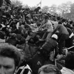 
              FILE - In this May 29, 1985 file photo, a crowd of soccer fans try to escape a collapsed wall prior to the start of the European Cup final between Liverpool and Juventus, at the Heysel Stadium in Brussels. Liverpool had been the dominant team in the European Cup, winning four titles between 1977 and 1984. The team was widely expected to beat Juventus for its fifth. But the match, which Juventus won 1-0 with a goal from Michel Platini, ended up a sideshow, taking place after 39 people were killed when a stadium wall collapsed. Liverpool and all English clubs were banned after the tragedy.  (AP Photo/Gianni Foggia, File)
            