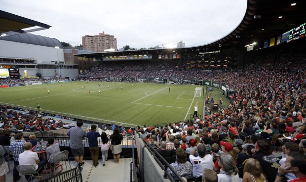 Fans at Providence Park watch the second half of an NWSL soccer match between the Portland Thorns a...