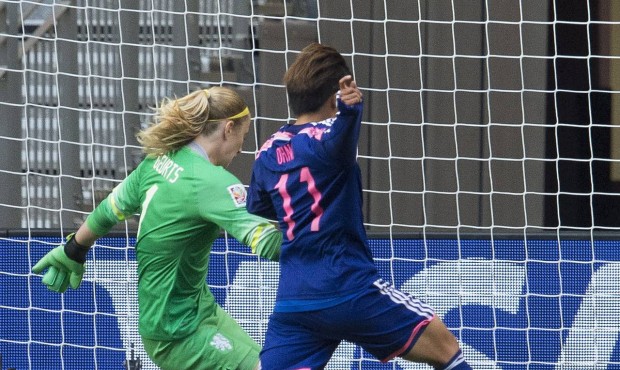 Japan’s Shinobu Ohno tries to get the ball past Netherlands goalkeeper Loes Geurts, left, dur...