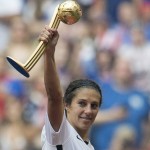 
              United States' Carli Lloyd holds the trophy after they defeated Japan 5-2 in the FIFA Women's World Cup soccer championship in Vancouver, British Columbia, Canada, Sunday, July 5, 2015. (Jonathan Hayward/The Canadian Press via AP) MANDATORY CREDIT
            