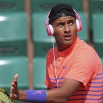 
              Australia's Nick Kyrgios wears pink headphones as he arrives to play the third round match of the French Open tennis tournament against Britain's Andy Murray at the Roland Garros stadium, in Paris, France, Saturday, May 30, 2015. (AP Photo/David Vincent)
            