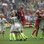 
              United States players celebrate after they defeated Japan 5-2 in the FIFA Women's World Cup soccer championship in Vancouver, British Columbia, Canada, Sunday, July 5, 2015. (Darryl Dyck/The Canadian Press via AP) MANDATORY CREDIT
            