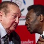 
              FILE - In this July 4, 2012,  file photo, Paraguay's Nicolas Leoz, President of the South American Football Confederation, CONMEBOL, and former FIFA executive member, left, speaks with former Brazilian soccer  player Pele during a news conference in Sao Paulo, Brazil. Interpol added six men with ties to FIFA to its most wanted list on Wednesday, June 3, 2015, issuing an international alert for two former FIFA officials and four executives on charges including racketeering and corruption. Two of the men, former FIFA vice president Jack Warner of Trinidad and former executive committee member Nicolas Leoz of Paraguay, have been arrested in their home counties. Warner has since been released and Leoz is under house arrest.   (AP Photo/Andre Penner, File)
            