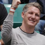 
              Bayern soccer player Germany's Bastian Schweinsteiger clenches his fist as Serbia's Ana Ivanovic playing Ukraine's Elina Svitolina during their quarterfinal match of the French Open tennis tournament at the Roland Garros stadium, Tuesday, June 2, 2015 in Paris, France. (AP Photo/Michel Euler)
            
