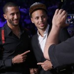 
              San Francisco 49ers quarterback Colin Kaepernick, left, poses for photos with Golden State Warriors guard Stephen Curry during a boxing event featuring Andre Ward against Paul Smith in a cruiserweight match in Oakland, Calif., Saturday, June 20, 2015. (AP Photo/Jeff Chiu)
            