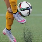 
              FILE - In this June 12, 2015, file photo, Australia's Samantha Kerr controls the ball during the second half of a FIFA Women's World Cup soccer game against Nigeria in Winnipeg, Manitoba, Canada. The fields are heating up, there are little black rubber pellets everywhere, and feet are covered with blisters.  The use of artificial turf at this year’s tournament in Canada has been a contentious issue with the players since it was included in the nation’s bid in 2011. (John Woods/The Canadian Press via AP, File)
            