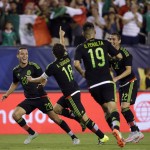 
              Mexico's Andres Guardado, (18) celebrates his goal with teammates during the first half of the CONCACAF Gold Cup championship soccer match against Jamaica, Sunday, July 26, 2015, in Philadelphia. (AP Photo/Michael Perez)
            