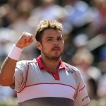 
              Switzerland's Stan Wawrinka clenches his fist as he plays Serbia's Novak Djokovic during their final match of the French Open tennis tournament at the Roland Garros stadium, Sunday, June 7, 2015 in Paris.  (AP Photo/Francois Mori)
            