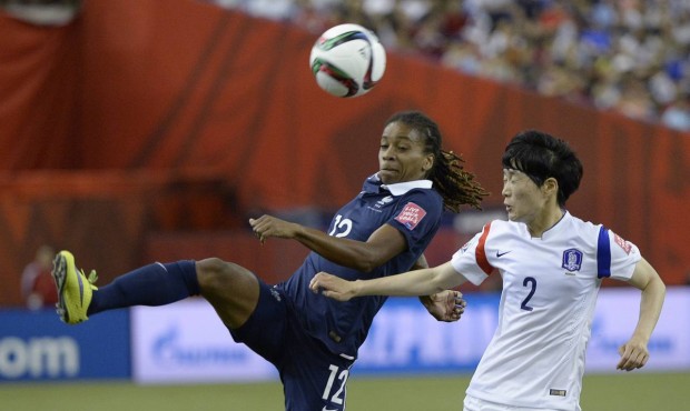 France’s Elodie Thomis plays the ball against South Korea’s Lee Eunmi during first half...