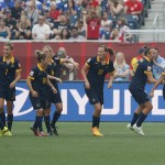 
              Australia's Lisa De Vanna, right, and her team celebrate De Vanna's goal against the United States during the first half of a FIFA Women's World Cup soccer match in Winnipeg, Manitoba, Monday, June 8, 2015. (John Woods/The Canadian Press via AP) MANDATORY CREDIT
            