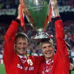 
              FILE - In this May 26, 1999, file photo, Manchester United's Teddy Sheringham, left, and David Beckham celebrate lift the trophy after defeating Bayern Munich 2-1 to win the Champions League soccer final in Barcelona, Spain. Manchester United took a few years to re-establish itself in European competition after the ban on English club participation was lifted. In 1999, United was going for a historic English treble when it met Bayern Munich. With the game already in injury time, any hope of adding the Champions League to the Premier League and FA Cup looked forlorn. However, in a stunning turnaround, goals from Sheringham and Ole Gunnar Solskjaer saw United win the trophy for the first time since 1968.(AP Photo/Camay Sungu, File)
            