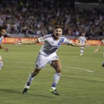 
              Los Angeles Galaxy's Steven Gerrard, center, of England, celebrates his first goal for the team, during the first half of an MLS soccer match against the San Jose Earthquakes, Friday, July 17, 2015, in Carson, Calif. (AP Photo/Jae C. Hong)
            